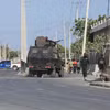 Lực lượng an ninh Somalia gác trên một đường phố ở Thủ đô Mogadishu. (Ảnh: AFP/TTXVN)