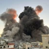 Khói bốc lên sau cuộc không kích của Israel tại Beirut (Liban). (Ảnh: IRNA/TTXVN)
