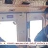 Hình ảnh do đài truyền hình nhà nước Iran IRINN phát ngày 19/5/2024: Tổng thống Iran Ebrahim Raisi (trái) trên trực thăng, trước khi chiếc máy bay bị rơi ở vùng núi tỉnh Đông Azerbaijan, phía Tây Bắc Iran. (Ảnh: AFP/TTXVN)
