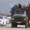 Người tị nạn Armenia rời khỏi Nagorny-Karabakh đi lánh nạn tới các thành phố của Armenia ngày 26/9/2023. (Ảnh: AFP/TTXVN)