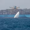 Tàu container của hãng Maersk di chuyển gần đảo Sir Abu Nuair hướng tới Dubai (Các Tiểu Vương quốc Arab Thống nhất). (Ảnh: AFP/TTXVN)
