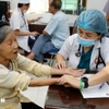Khám bệnh miễn phí cho thương bệnh binh, gia đình chính sách. (Ảnh minh họa: Trần Việt/TTXVN)