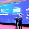 Thứ trưởng Nguyễn Sinh Nhật Tân phát biểu tại Diễn đàn Thương hiệu Quốc gia do Bộ Công Thương tổ chức sáng 16/4, tại Hà Nội. (Ảnh: Đức Duy/Vietnam+)