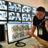 Công an Trung Quốc giám sát thi cử. (Nguồn: Reuters)