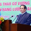 Thủ tướng Phạm Minh Chính chủ trì hội nghị tháo gỡ khó khăn cho các dự án năng lượng tái tạo. (Ảnh: Dương Giang.TTXVN)