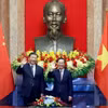 Chủ tịch nước Võ Văn Thưởng và Tổng Bí thư, Chủ tịch nước Trung Quốc Tập Cận Bình chụp ảnh chung. (Ảnh: Thống Nhất/TTXVN)