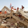 Hoạt động cứu hộ được tiến hành tại hiện trường động đất ở tỉnh Cam Túc, Trung Quốc. (Ảnh: THX/TTXVN)