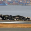 Máy bay chở khách của Hãng hàng không Japan Airlines sau vụ va chạm tại sân bay Haneda ở Tokyo, Nhật Bản. (Ảnh: Kyodo/TTXVN) 