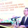 Thứ trưởng Bộ Lao động, Thương binh và Xã hội Lê Văn Thanh phát biểu khai mạc Hội nghị. (Ảnh: Quốc Khánh/TTXVN)