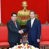 Trưởng Ban Kinh tế Trung ương Trần Tuấn Anh tiếp Tổng Bí thư Đảng Cộng sản Peru Luis Alberto Villanueva Carbajal. (Ảnh: Phương Hoa/TTXVN)