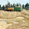 Một vụ khai thác cát vi phạm pháp luật (Ảnh minh họa: TTXVN)