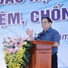 Thủ tướng Phạm Minh Chính phát động thi đua đẩy mạnh phát triển hạ tầng đồng bộ, hiện đại, chống lãng phí. (Ảnh: Dương Giang/TTXVN)