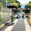 Cơ quan công an khám nghiệm hiện trường vụ việc tại cầu sắt huyện Đạ Tẻh. (Nguồn: Báo Lâm Đồng)