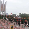An táng hài cốt liệt sỹ. (Ảnh: Trịnh Duy Hưng/TTXVN)