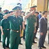 Đại diện Ban Chỉ đạo 515 tỉnh Quảng Bình và Ban Công tác đặc biệt tỉnh Khammouan mặc niệm tưởng nhớ các anh hùng liệt sỹ. (Nguồn: Báo Quảng Bình)