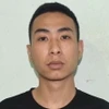 Đối tượng Nguyễn Văn Độ tại cơ quan công an. (Ảnh: TTXVN phát)