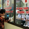Hà Nội: Hỗ trợ 100% mức đóng BHYT cho một số nhóm đối tượng. (Ảnh minh họa: Việt Dũng/TTXVN)