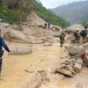 Nhân viên cứu hộ làm việc tại hiện trường vụ lở đất ở tỉnh Cundinamarca, Colombia . (Nguồn: AFP)