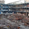 Hiện trường đổ nát tại một trường học sau vụ oanh tạc của Israel xuống Beit Lahia, Dải Gaza, ngày 26/12/2023. (Ảnh: AA/TTXVN)