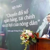 Ông Phạm Anh Tuấn, Vụ Trưởng Vụ Thanh toán Ngân hàng Nhà nước Việt Nam nêu ra nhiều vấn đề về chính sách. (Ảnh: PV/Vietnam+)