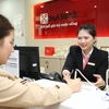 Giao dịch tại SeABank. (Ảnh: Vietnam+)