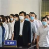 Các bị cáo tại phiên tòa xét xử sơ thẩm hồi tháng 9/2022. (Ảnh: Tuấn Anh/TTXVN)