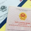 Làm thủ tục về đất đai. (Nguồn: Vietnam+)