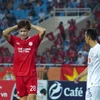 Hoàng Đức (áo đỏ) và các đồng đội nhận trận thua đầu tiên tại V-League 2024-2025. (Ảnh: Việt Anh/Vietnam+)