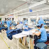 Dệt may đẩy mạnh ứng dụng công nghệ, đón đầu xu hướng tăng trưởng Xanh. (Ảnh: Đức Duy/Vietnam+)