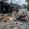 Hiện trường đổ nát sau một vụ tấn công của các băng nhóm vũ trang ở Port-au-Prince, Haiti ngày 20/3/2024. (Ảnh: AFP/TTXVN)
