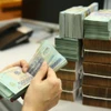 Chỉ tính riêng năm 2023, số việc phải thi hành án tham nhũng, kinh tế của Cục Thi hành Án Dân sự Thành phố Hồ Chí Minh là 468/4879 việc của toàn quốc. Số tiền phải thi hành án hơn 74.000 tỷ đồng, kết quả thu hồi hiện đạt hơn 17.000 tỷ đồng, chiếm tương ứng 76,87% và 87,15% của toàn quốc. (Ảnh: PV/Vietnam+)