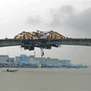 Hai bờ Nam-Bắc của cửa biển Sông Đốc, cửa sầm uất nhất khu vực Đồng bằng sông Cửu Long, chính thức được kết nối vào ngày 11/11. (Ảnh: Huỳnh Anh/TTXVN)