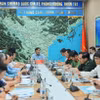 Quang cảnh buổi họp ứng phó với áp thấp nhiệt đới và mưa lớn. (Ảnh: Hoàng Hiếu/TTXVN)