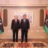 Đại sứ Việt Nam tại Ai Cập kiêm nhiệm Libya Nguyễn Huy Dũng và Chủ tịch Hội đồng Tổng thống Libya Muhammad Al-Menfi. (Ảnh: Nguyễn Trường/TTXVN)