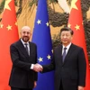 Chủ tịch Trung Quốc Tập Cận Bình (phải) và Chủ tịch Hội đồng châu Âu Charles Michel. (Nguồn: Reuters)