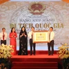 Đón nhận Bằng xếp hạng Di tích Lịch sử Quốc gia Đền thờ Lê Khắc Cẩn. (Ảnh: Hoàng Ngọc/TTXVN)