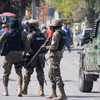 Cảnh sát siết chặt an ninh tại Port-au-Prince, Haiti ngày 9/3/2024. (Ảnh: AFP/TTXVN)