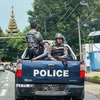 Cảnh sát tuần tra trên đường phố tại Yangon, Myanmar, ngày 19/7/2023. (Ảnh: AFP/TTXVN)