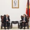 Phó Thủ tướng Trần Lưu Quang tiếp Bộ trưởng Cựu chiến binh và Người có công Algeria Laid Rebigua. (Ảnh: Lâm Khánh/TTXVN)