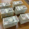 Đồng tiền mệnh giá 10000 yen của Nhật Bản. (Ảnh: AFP/TTXVN)