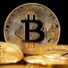 Đồng tiền kỹ thuật số bitcoin. (Ảnh: Getty Images/TTXVN)