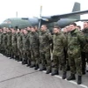 Binh sỹ Đức được điều động tới Litva tham gia sứ mệnh của NATO, tới sân bay Kaunas ở Karmelava. (Ảnh: AFP/TTXVN)