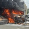 Hiện trường vụ container bốc cháy sau tai nạn liên hoàn