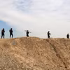 Các lực lượng Iraq tham gia chiến dịch truy quét IS tại al-Miqdadiyah, tỉnh Diyala, Iraq, ngày 10/3/2024. (Ảnh: AFP/TTXVN)