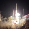 Tên lửa đẩy "Chollima-1” mang theo vệ tinh trinh sát “Malligyong-1” rời bệ phóng tại Bãi phóng vệ tinh Sohae ở quận Cholsan, tỉnh Bắc Phyongan, Triều Tiên ngày 21/11/2023. (Ảnh: Yonhap/TTXVN)