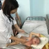 Trẻ mắc bệnh sởi được điều trị tại Bệnh viện Nhi đồng 1 Thành phố Hồ Chí Minh. (Ảnh: Đinh Hằng/TTXVN)