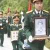Đưa hài cốt liệt sỹ Lò Văn Nối về an táng tại nghĩa trang liệt sỹ thị xã Nghĩa Lộ, tỉnh Yên Bái. (Ảnh: Việt Dũng/TTXVN)
