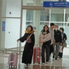 Hành khách tại Cảng hàng không Liên Khương. (Ảnh: Nguyễn Dũng/TTXVN)