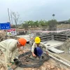 Thi công vị trí 164 dự án đường dây 500kV Nhà máy Nhiệt điện Nam Định 1-Thanh Hóa. (Nguồn: Vietnam+)