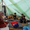 Trẻ em Palestine tại khu lều tạm ở Khan Younis, phía nam Dải Gaza, ngày 13/12/2023. (Ảnh: THX/TTXVN)